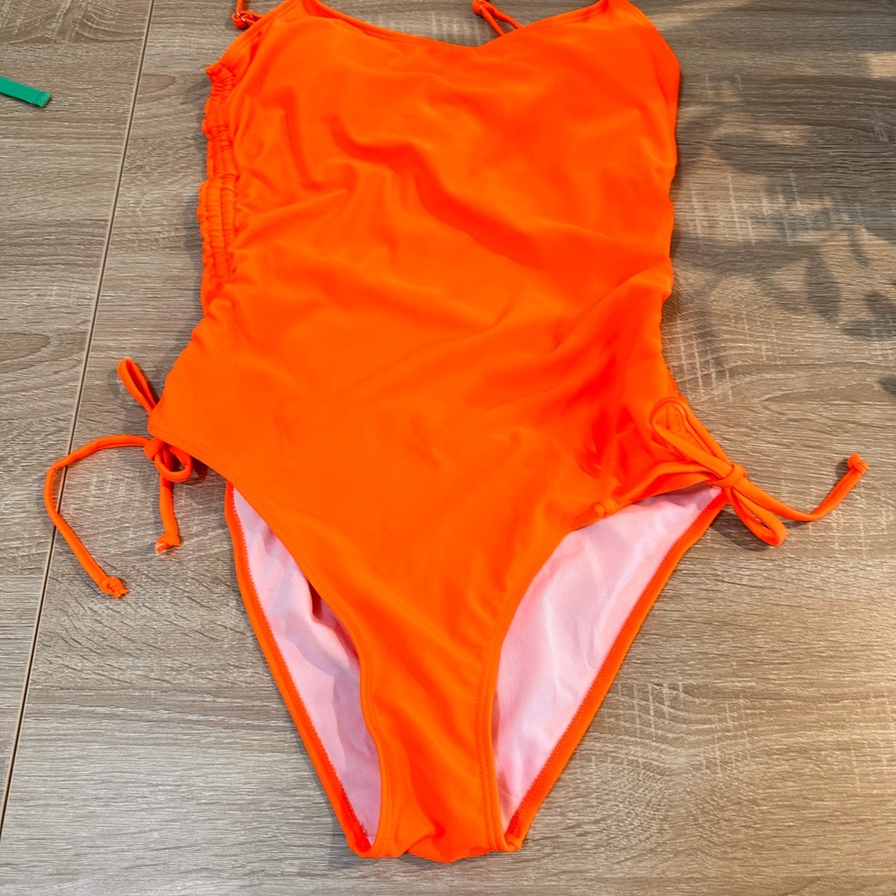 Amazon Orange One Piece Swimwear Classic Design.  New without tags